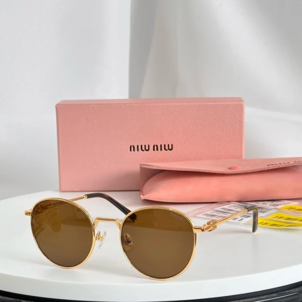 Miu Miu MM-SG66 logo sunglasses showcasing oversized silhouette and fashion-forward style