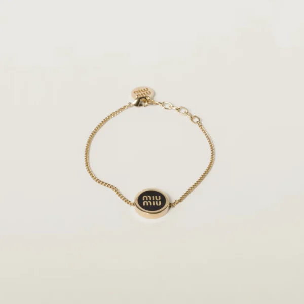 Miu Miu enameled metal bracelet featuring glossy finish and vibrant colors