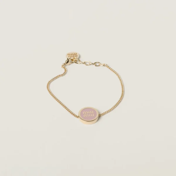 Miu Miu Enameled metal bracelet in soft pink with glossy finish and modern design