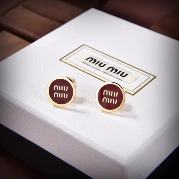Miu Miu enameled metal earrings featuring glossy finish and elegant design