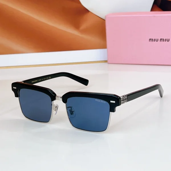 Luxury Miu Miu browline sunglasses featuring a bold acetate top frame, refined metal rims, and signature logo engraved on the temples
