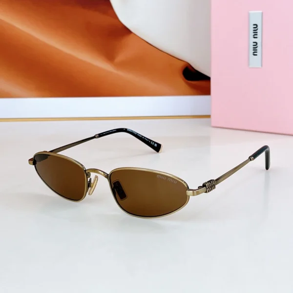 Miu Miu Logo oval sunglasses with slim oval lenses and bold logo detailing on the arms