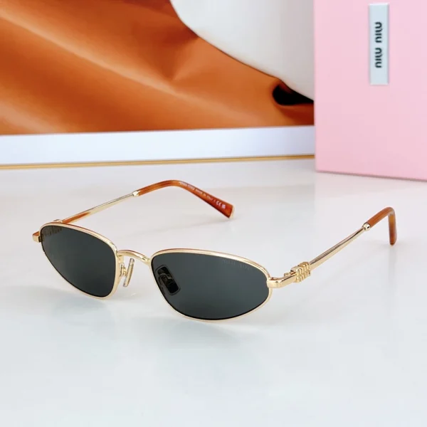 Bold and playful – Miu Miu Logo oval sunglasses that blend retro flair with designer edge