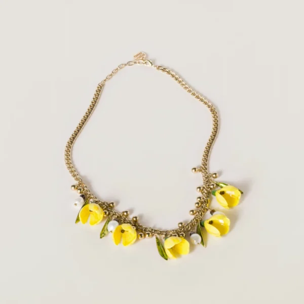 Miu Miu necklace featuring polished metal and colored resin links in a bold design