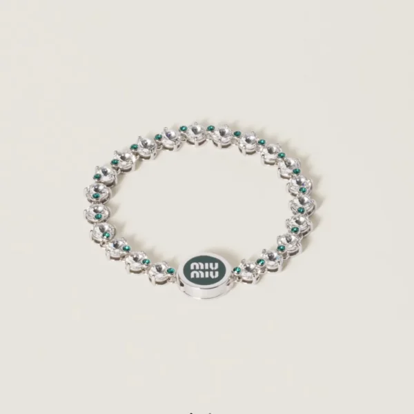 Miu Miu metal bracelet adorned with sparkling crystals and polished finish