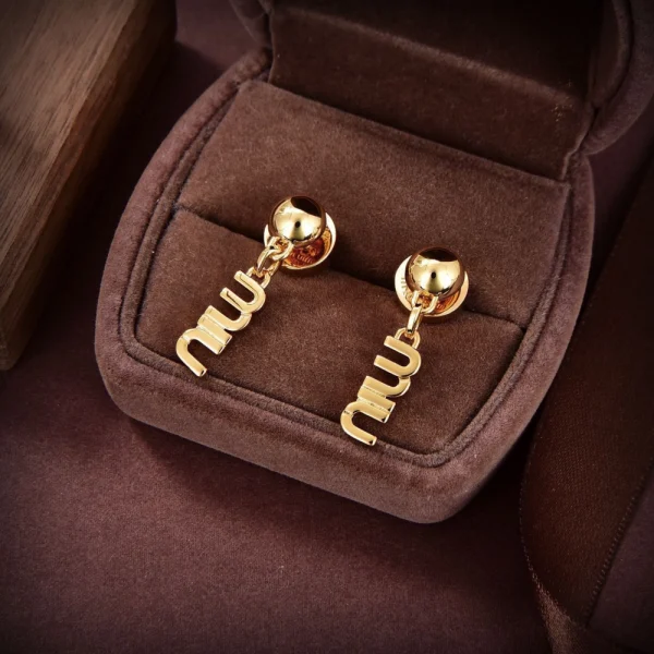 Miu Miu metal earrings with sleek polished finish and minimalist design