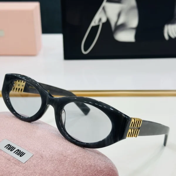 Miu Miu Miu Glimpse sunglasses featuring bold frame design and tinted lenses with modern edge