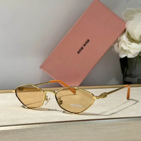 Miu Miu Miu Miu logo sunglasses featuring bold temple branding and tinted gradient lenses