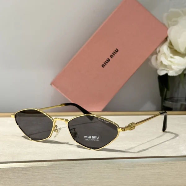 Close-up of Miu Miu Miu Miu MM-SG29 sunglasses with tinted lenses and signature logo detail