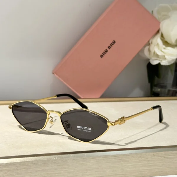Close-up of Miu Miu Miu Miu sunglasses with oversized frame and signature logo detail