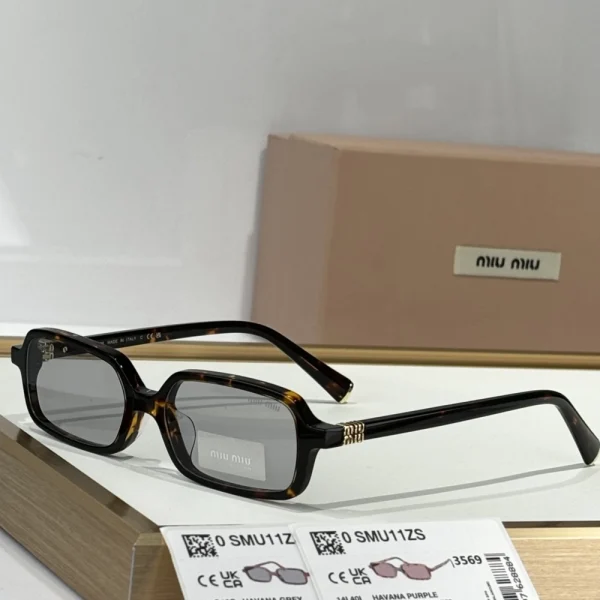 Miu Miu Miu Regard sunglasses MM-SG38 featuring oversized geometric frame and gradient lenses