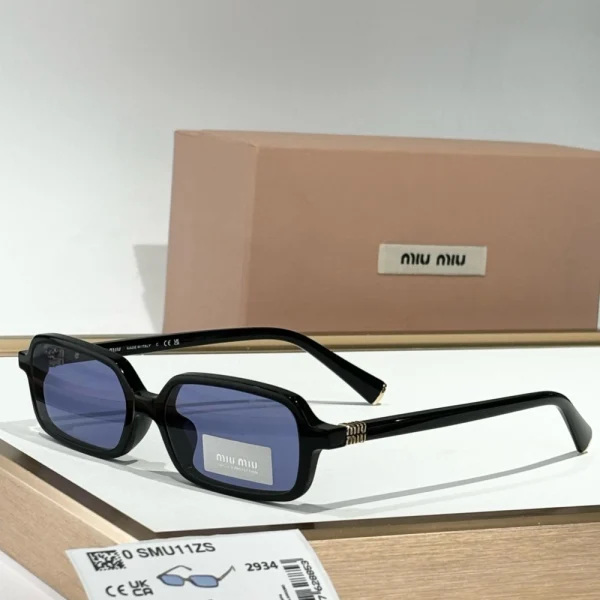 Close-up of Miu Miu Miu MM-SG39 Regard sunglasses with bold silhouette and polished finish
