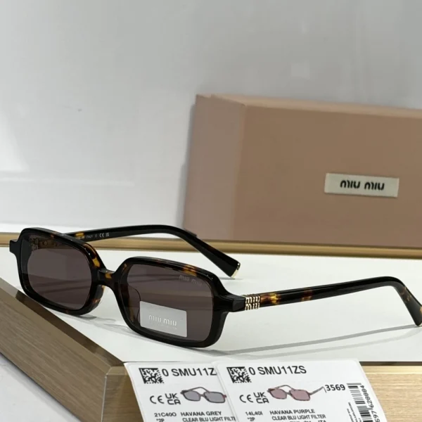 Miu Miu Miu Regard MM-SG41 sunglasses styled with a modern outfit for a high-fashion look