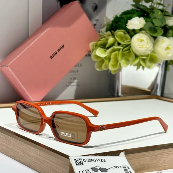 Elegant Miu Miu Miu Regard MM-SG43 sunglasses with soft gradient lenses and sculpted frame