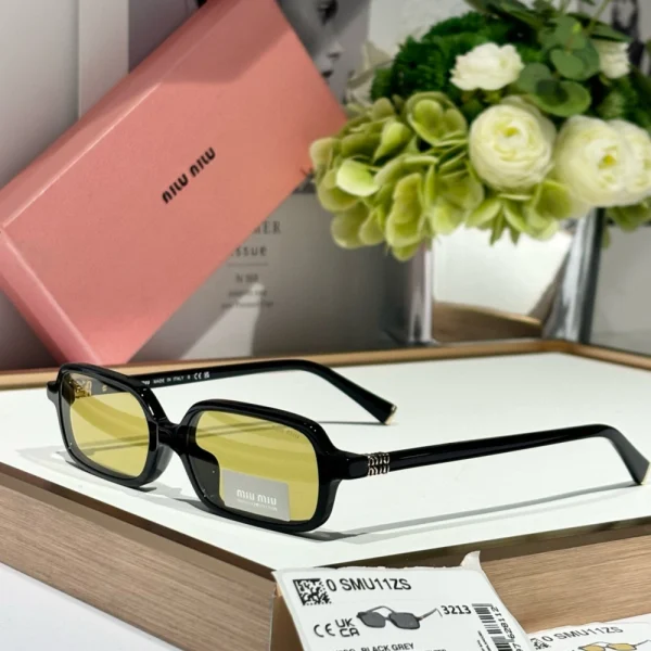 Miu Miu Miu MM-SG44 Regard sunglasses displayed with branded packaging and accessories