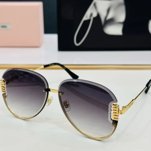 Designer Miu Miu sunglasses styled on white background, emphasizing clean lines and high-end construction