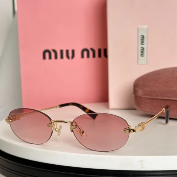 Miu Miu sunglasses MM-SG18 featuring bold frame design and gradient tinted lenses