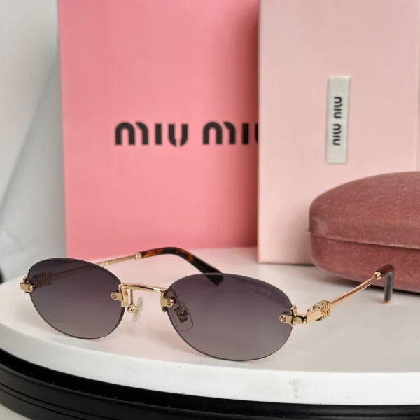 Close-up of Miu Miu MM-SG19 sunglasses with signature silhouette and polished finish
