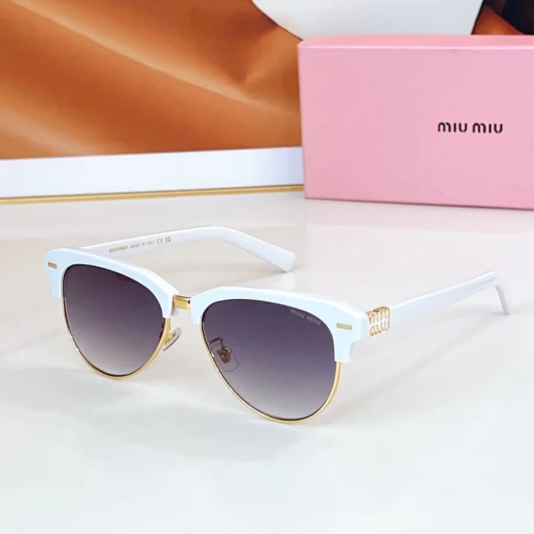 Showcase of Miu Miu sunglasses with elegant packaging set in the background for a luxury feel