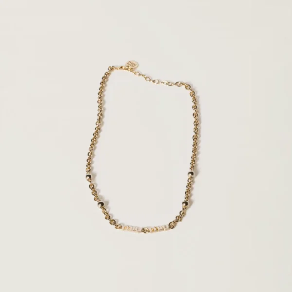 Miu Miu logo necklace featuring polished metal and signature brand lettering
