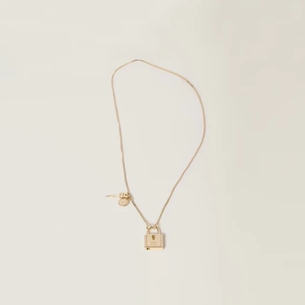 Close-up of Miu Miu necklace crafted from silver-tone metal with elegant details
