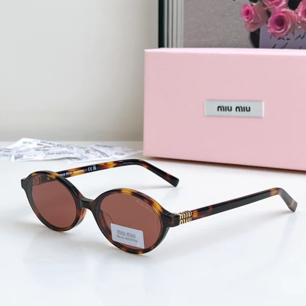 MiuMiu Miu Regard sunglasses showcasing signature designer silhouette and tinted lenses