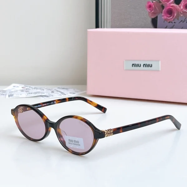 Front view of MiuMiu Miu Regard sunglasses with sleek designer styling