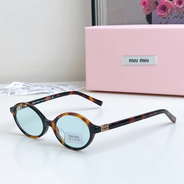 Front view of MiuMiu MM-SG59 Regard sunglasses with sleek oversized design and tinted lenses