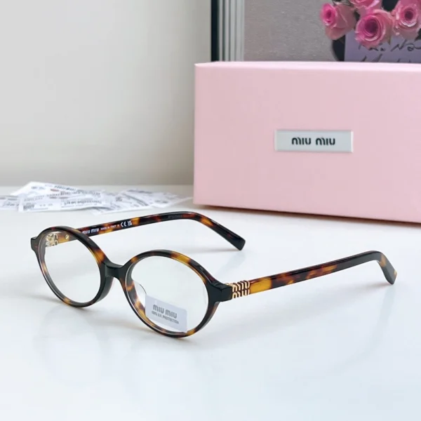 MiuMiu MM-SG60 sunglasses from the Miu Regard line showcasing signature fashion-forward styling
