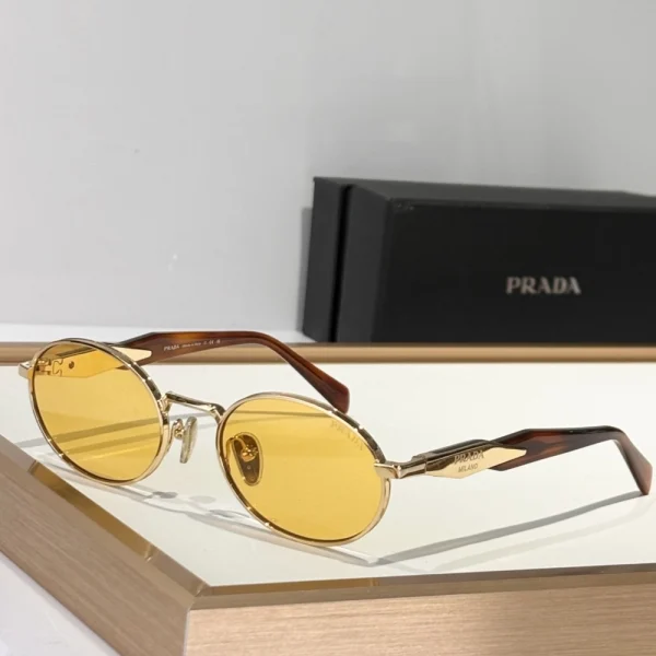 Prada Eyewear Collection sunglasses placed on a fashion magazine, highlighting premium Italian craftsmanship