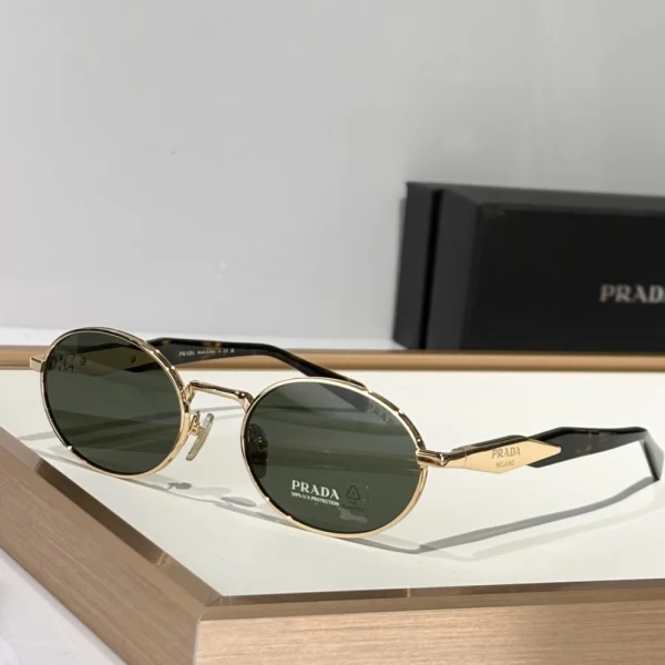 Angled shot of Prada Eyewear Collection sunglasses emphasizing the sculpted temples and logo detail