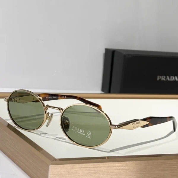 Oversized Prada sunglasses from Eyewear Collection displayed against soft neutral background