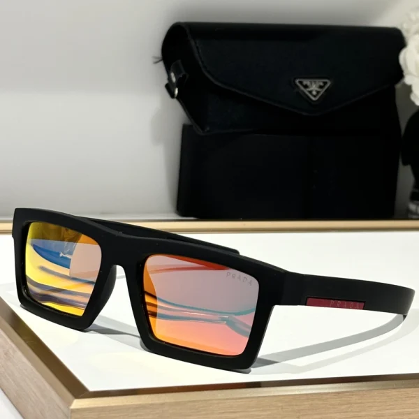Side profile of Prada Linea Rossa Impavid sunglasses with wraparound lens, perfect for activewear or urban street style