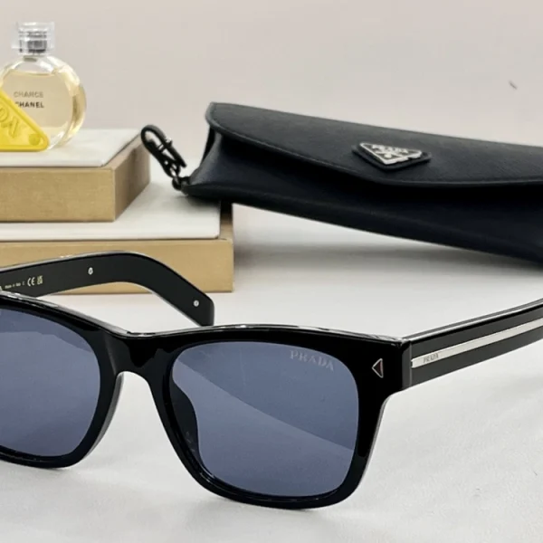 Modern Prada sunglasses with structured temples and iconic engraved metal plaque for high-end branding