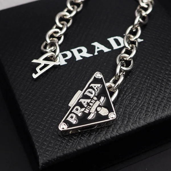 Luxury Prada Symbole bracelet showcasing sleek silver finish and timeless Italian craftsmanship.