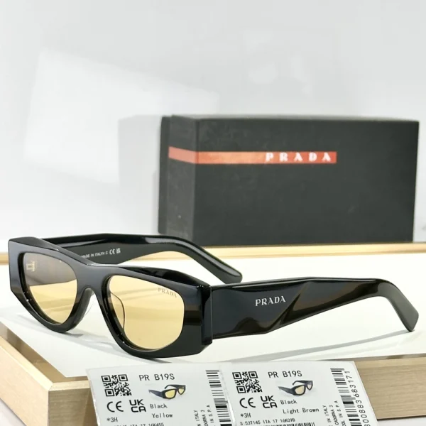 Front-facing Prada Symbole sunglasses with square frame and tinted lenses, displayed on a clean white surface