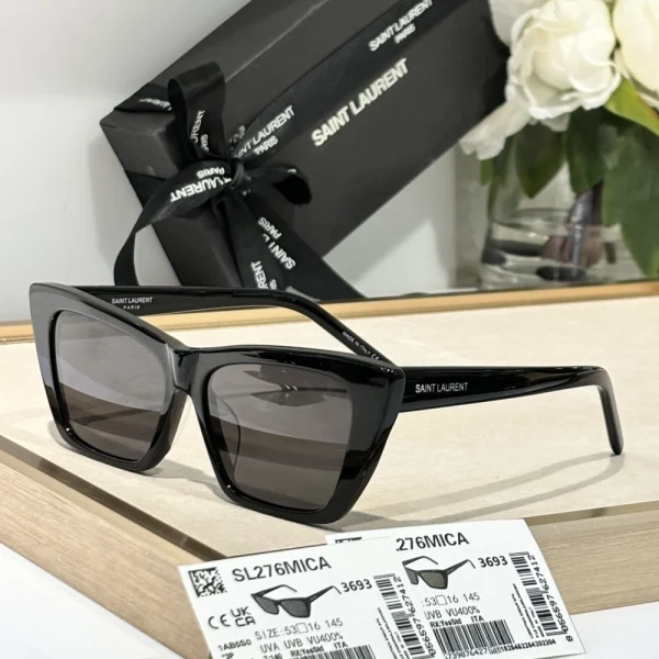 Close-up of Saint Laurent SL 276 Mica sunglasses highlighting polished acetate frame and subtle temple logo
