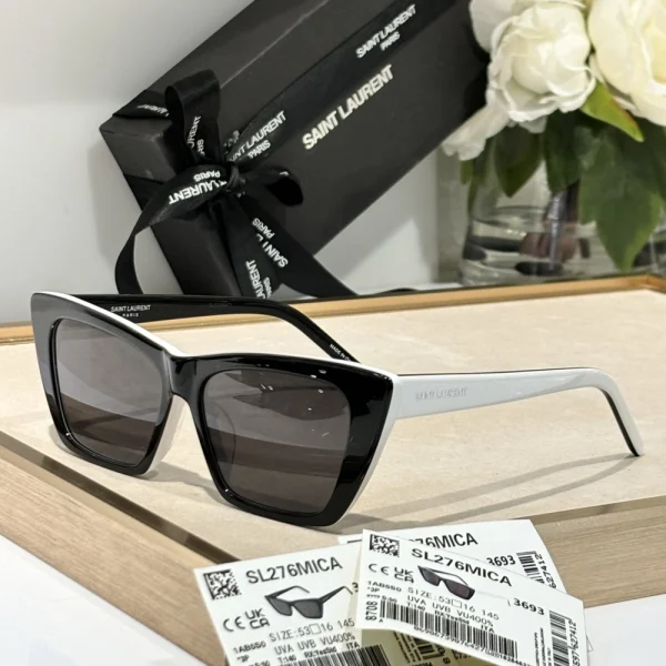 Black Saint Laurent SL 276 Mica sunglasses styled with neutral-toned accessories for a minimalist aesthetic