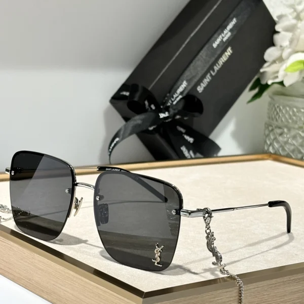 Elegant SL 312 M sunglasses by Saint Laurent with streamlined silhouette and luxury finish