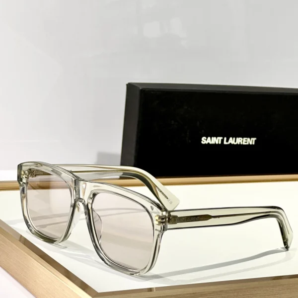 Front view of Saint Laurent SL 558 sunglasses showcasing structured square silhouette and refined details