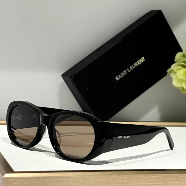 Minimalist SL 736 sunglasses from Saint Laurent with structured design and edgy silhouette