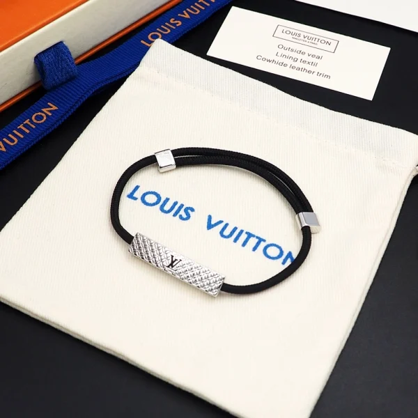 Louis Vuitton Champs Elysées Bracelet Black displayed with original LV packaging