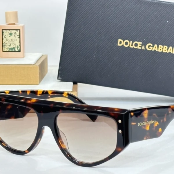 Elegant Dolce & Gabbana DG Sharped Sunglasses perfect for men and women seeking standout looks