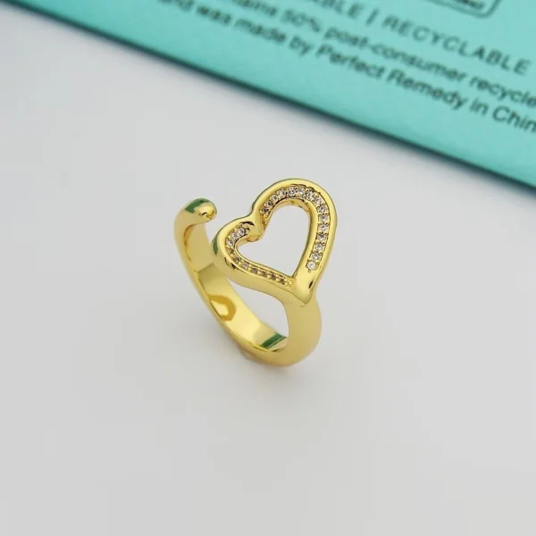 Elsa Peretti Open Heart Ring displayed on finger, emphasizing refined craftsmanship and classic design