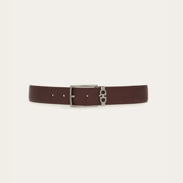 Ferragamo Reversible and Adjustable Gancini Belt crafted with smooth dual-tone leather and the iconic Gancini buckle