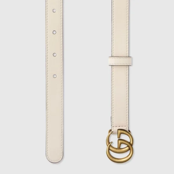Refined Gucci GG Marmont Belt in white, showcasing a slim silhouette and antique gold-tone GG hardware