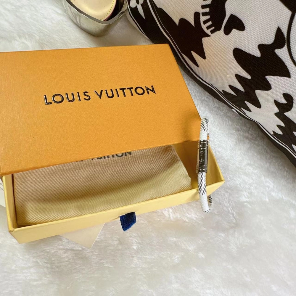 Louis Vuitton Keep It Bracelet placed in original LV box with embossed logo