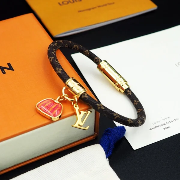 Side profile of Louis Vuitton LV x YK Hang It Bracelet showing adjustable clasp and modern chain design