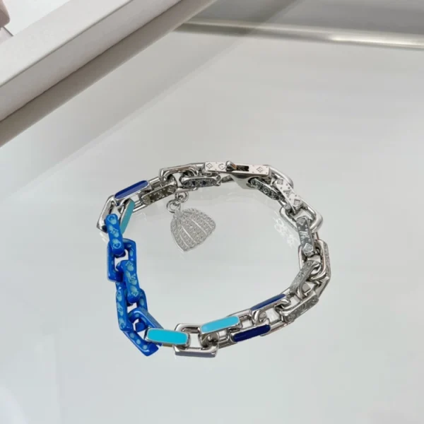 Louis Vuitton Monogram Chain Bracelet crafted in polished metal with the iconic LV monogram links