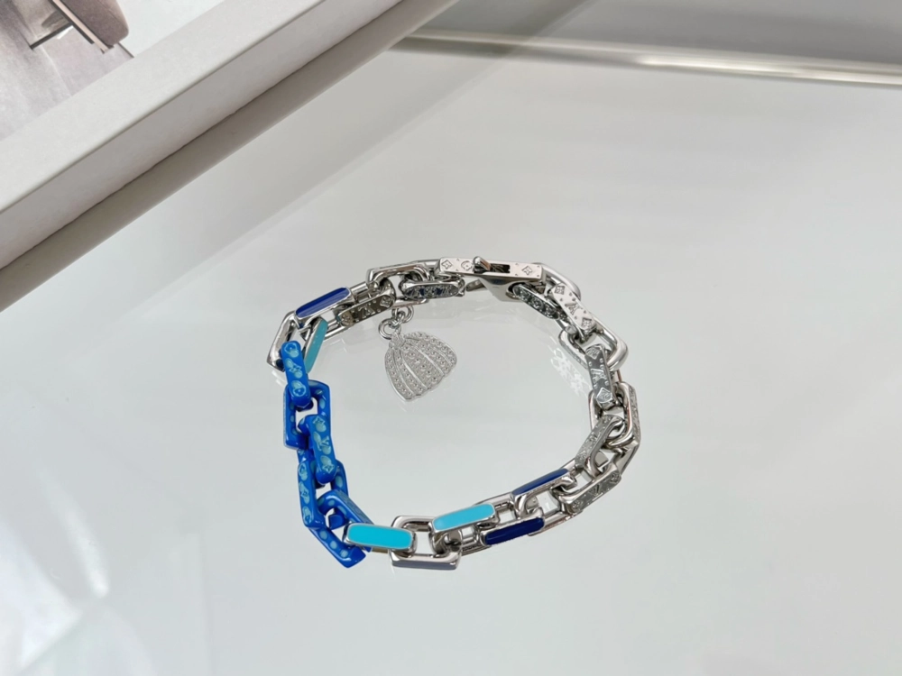 Louis Vuitton Monogram Chain Bracelet crafted in polished metal with the iconic LV monogram links
